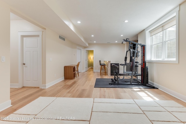 6075 Sacramento Way E, Lansing, MI 48823 - exercise room with wood finished floors and recessed lighting