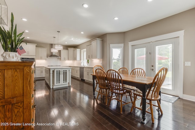 6075 Sacramento Way E, Lansing, MI 48823 - dining space with french doors, dark wood-style flooring, and recessed lighting