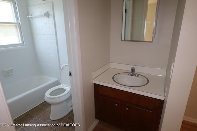 3700-3702 Malibu Dr, Lansing, MI 48911 - bathroom with vanity, bathing tub / shower combination, and tile patterned floors
