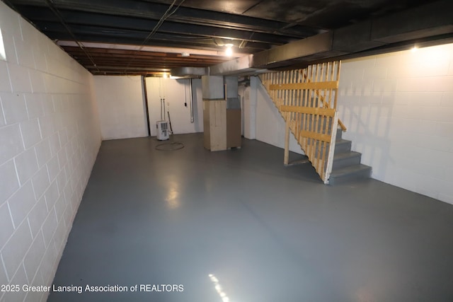 3700-3702 Malibu Dr, Lansing, MI 48911 - unfinished below grade area with stairway and concrete block wall