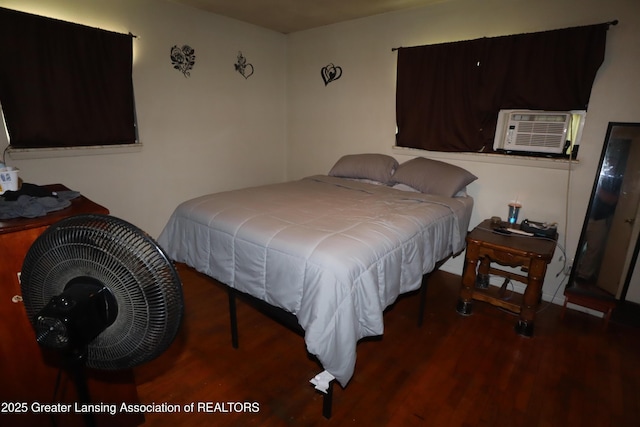 3700-3702 Malibu Dr, Lansing, MI 48911 - bedroom with wood finished floors and cooling unit