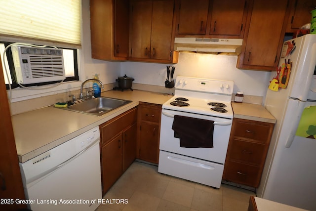 3700-3702 Malibu Dr, Lansing, MI 48911 - kitchen featuring under cabinet range hood, white appliances, light countertops, and cooling unit