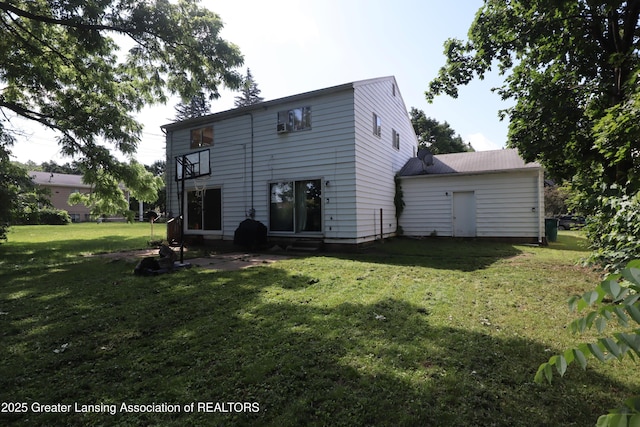 3700-3702 Malibu Dr, Lansing, MI 48911 - rear view of house featuring a lawn, a patio, and a balcony