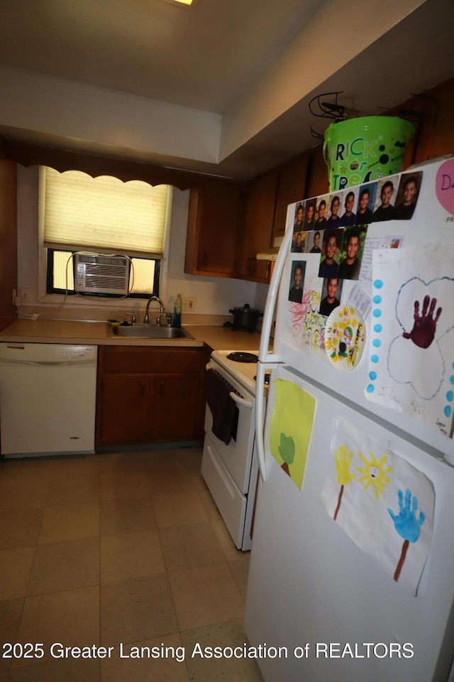 3700-3702 Malibu Dr, Lansing, MI 48911 - kitchen featuring white appliances, light countertops, and cooling unit