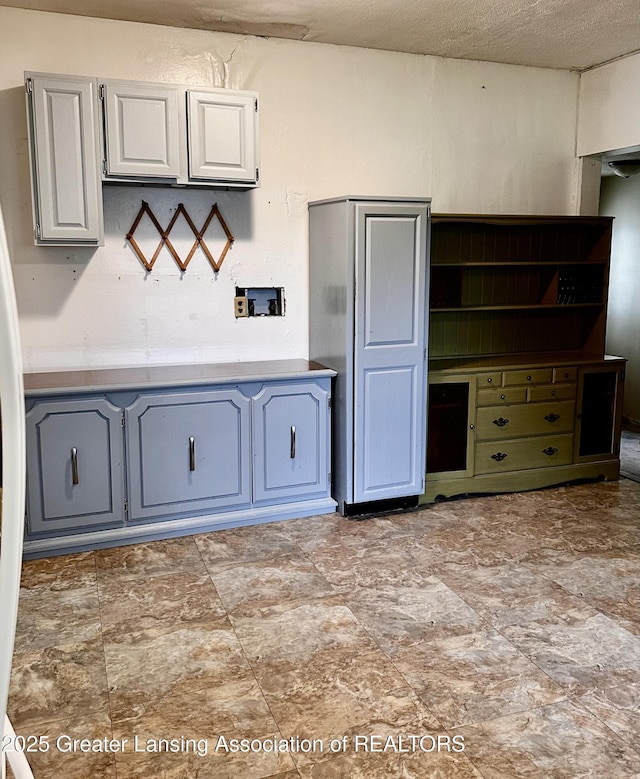 1115 Rose Ave, Big Rapids, MI 49307 - kitchen with gray cabinets