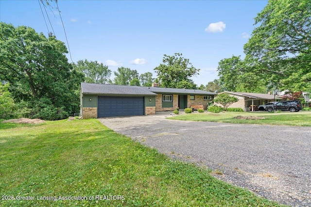 1395 Biscayne Way, Haslett, MI 48840 - view of front facade featuring brick siding, a garage, a chimney, and a front lawn
