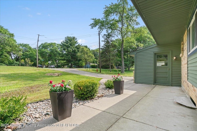 1395 Biscayne Way, Haslett, MI 48840 - view of patio featuring view of scattered trees