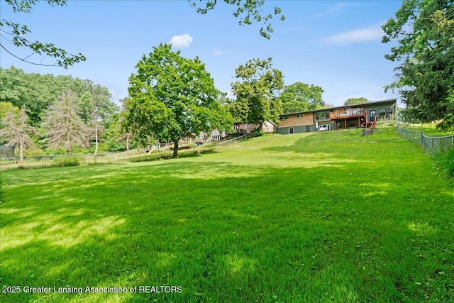 1395 Biscayne Way, Haslett, MI 48840 - view of yard featuring a deck