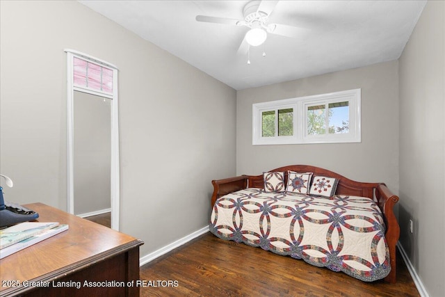 1395 Biscayne Way, Haslett, MI 48840 - bedroom with wood finished floors, ceiling fan, and a desk