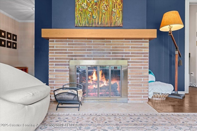 1395 Biscayne Way, Haslett, MI 48840 - detailed view of a brick fireplace, wood finished floors, and crown molding