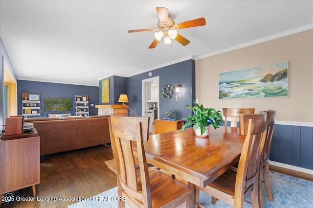 1395 Biscayne Way, Haslett, MI 48840 - dining space with wood finished floors, crown molding, and a ceiling fan