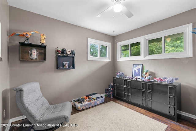 1395 Biscayne Way, Haslett, MI 48840 - living area with wood finished floors and a ceiling fan