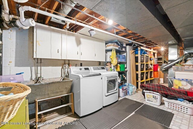 1395 Biscayne Way, Haslett, MI 48840 - washroom featuring independent washer and dryer and cabinet space