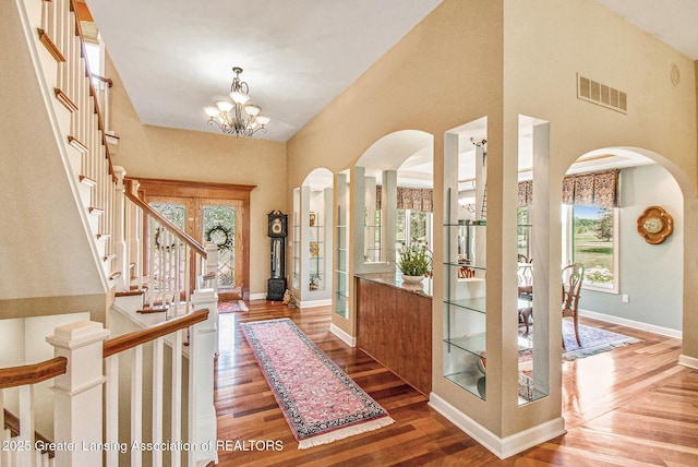 10696 W Clark Rd, Eagle, MI 48822 - entryway with arched walkways, healthy amount of natural light, and a towering ceiling