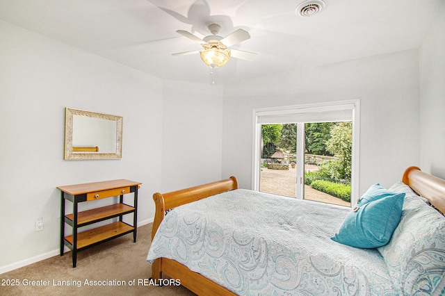 10696 W Clark Rd, Eagle, MI 48822 - carpeted bedroom with baseboards and a ceiling fan