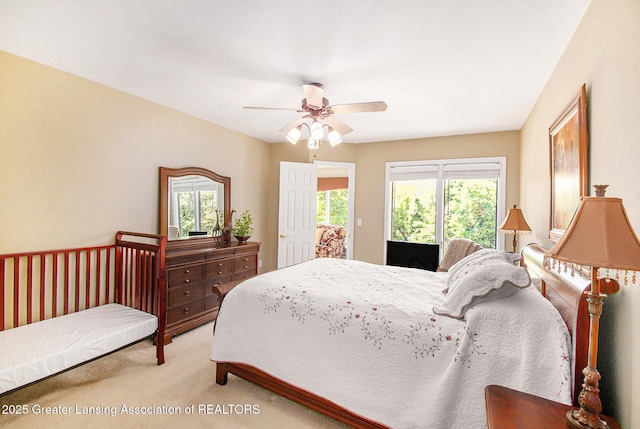 10696 W Clark Rd, Eagle, MI 48822 - carpeted bedroom featuring ceiling fan and access to outside