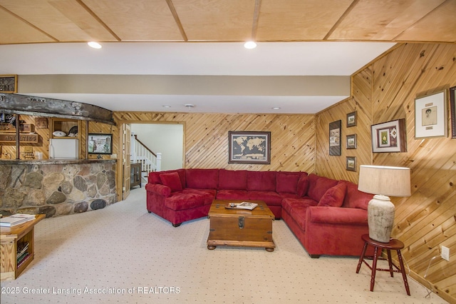 10696 W Clark Rd, Eagle, MI 48822 - carpeted living area featuring wooden walls, stairway, and recessed lighting