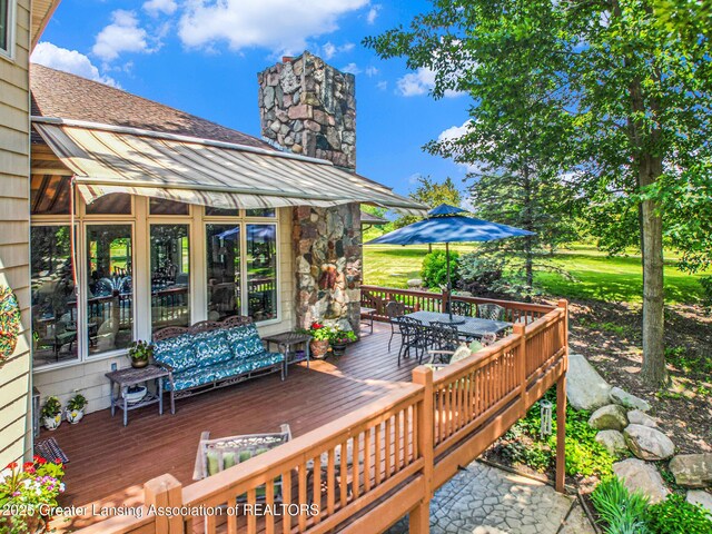 10696 W Clark Rd, Eagle, MI 48822 - deck with outdoor dining area