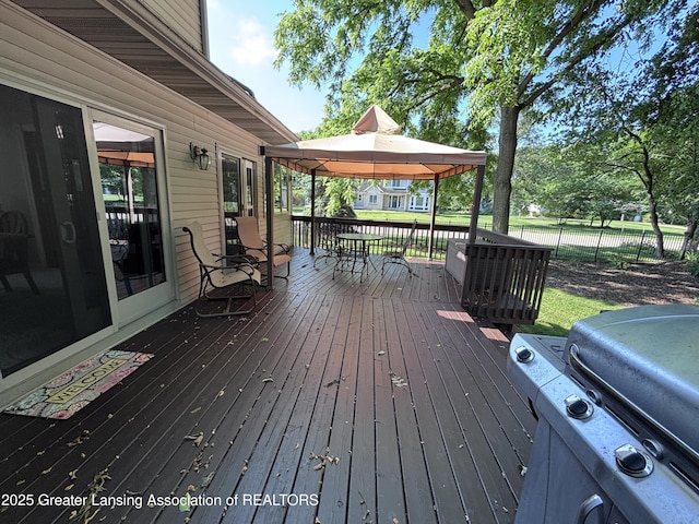 2665 Allium Dr, Holt, MI 48842 - wooden terrace featuring a gazebo and a grill