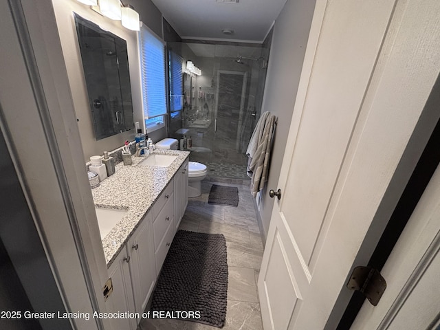 2665 Allium Dr, Holt, MI 48842 - full bath with a stall shower, double vanity, and marble finish flooring