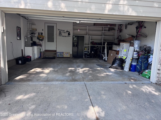 2665 Allium Dr, Holt, MI 48842 - garage with driveway