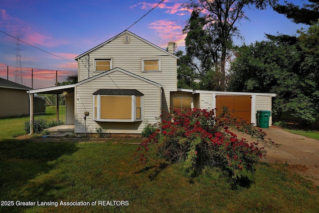 321 Lamb St, Perry, MI 48872 - view of front of house featuring a front lawn