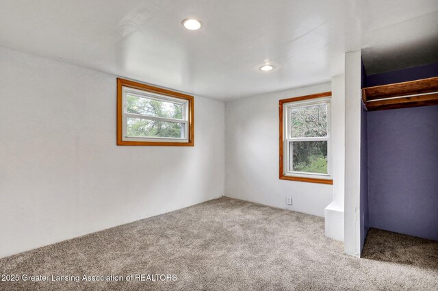 321 Lamb St, Perry, MI 48872 - unfurnished bedroom featuring carpet floors and recessed lighting