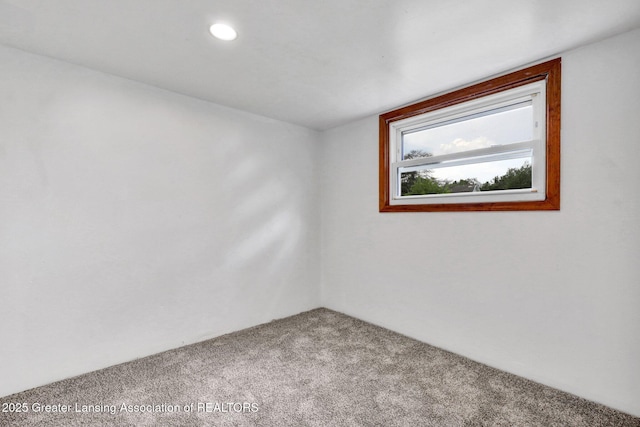 321 Lamb St, Perry, MI 48872 - carpeted empty room featuring recessed lighting