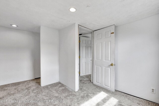 321 Lamb St, Perry, MI 48872 - unfurnished bedroom with carpet floors and recessed lighting