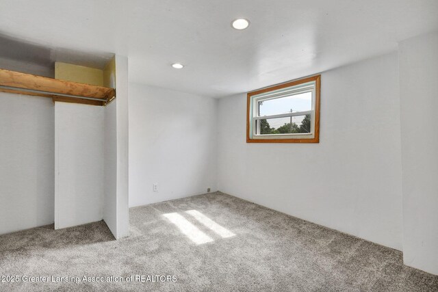 321 Lamb St, Perry, MI 48872 - unfurnished bedroom with carpet flooring, a closet, and recessed lighting