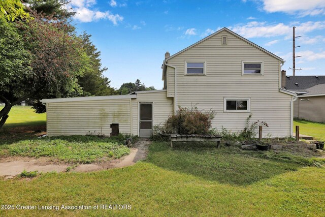 321 Lamb St, Perry, MI 48872 - back of property with a yard