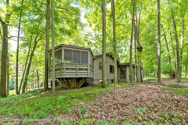 13368 Forest Hill Rd, Grand Ledge, MI 48837 - rear view of property with a sunroom