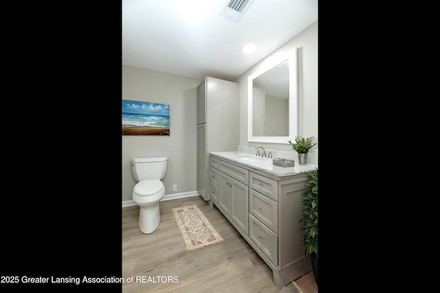 13368 Forest Hill Rd, Grand Ledge, MI 48837 - bathroom featuring vanity and wood finished floors