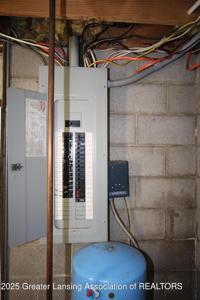 10996 Benton Rd, Grand Ledge, MI 48837 - utility room featuring electric panel
