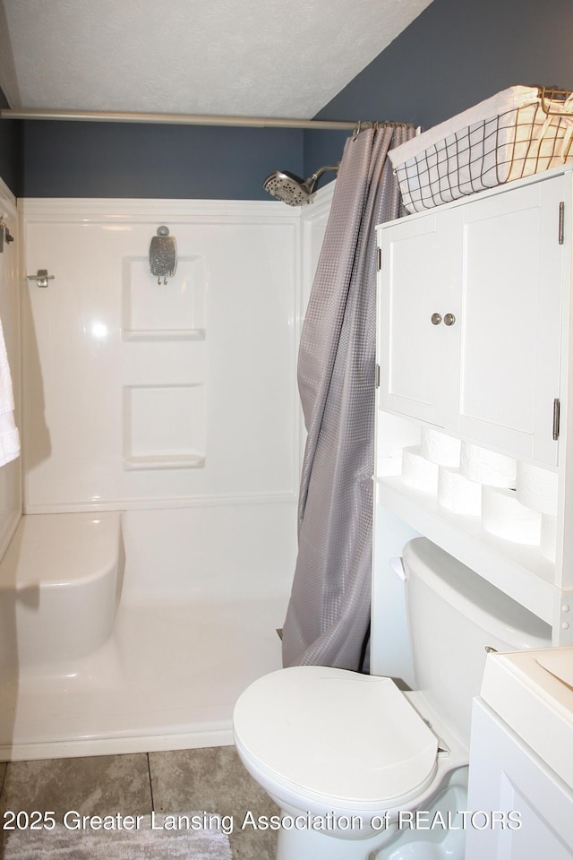 10996 Benton Rd, Grand Ledge, MI 48837 - bathroom featuring a shower with shower curtain, tile patterned flooring, and vanity