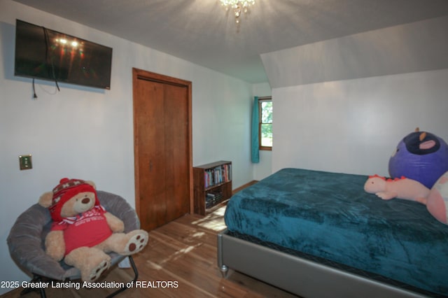 10996 Benton Rd, Grand Ledge, MI 48837 - bedroom with wood finished floors