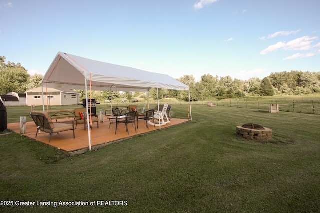 10996 Benton Rd, Grand Ledge, MI 48837 - view of community with an outdoor fire pit, a gazebo, and a deck