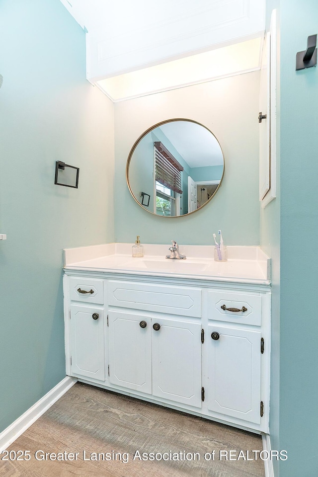3855 Sandlewood Dr, Okemos, MI 48864 - bathroom with vanity and baseboards