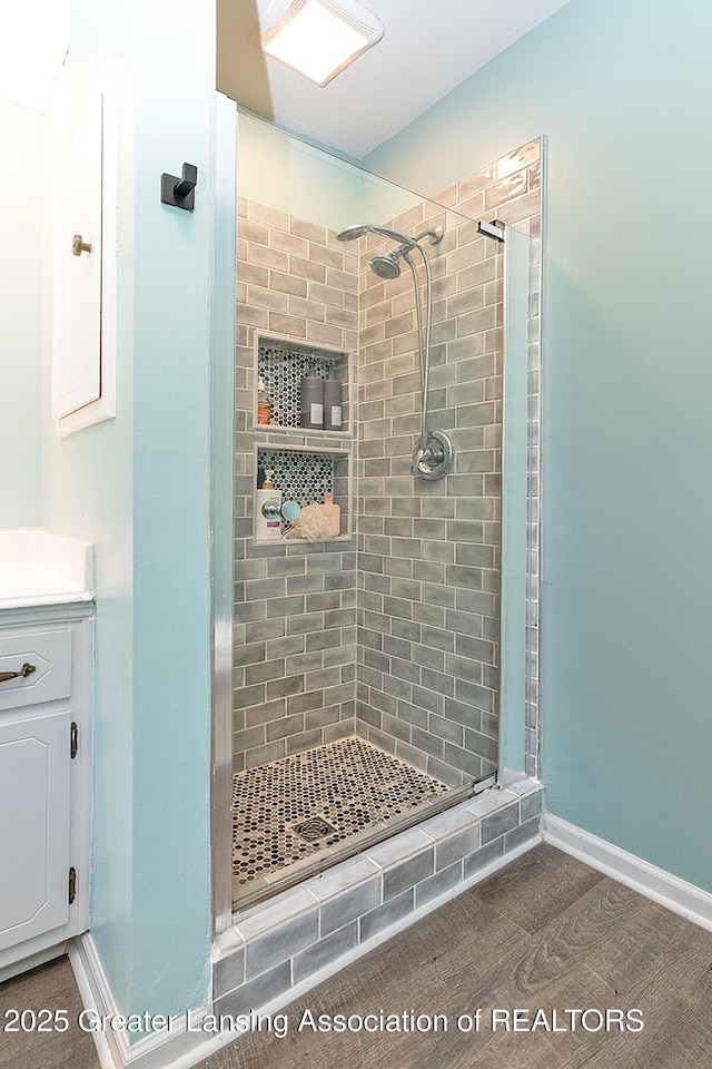 3855 Sandlewood Dr, Okemos, MI 48864 - full bath featuring a shower stall and vanity