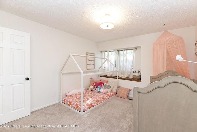 3855 Sandlewood Dr, Okemos, MI 48864 - carpeted bedroom with baseboards and a textured ceiling