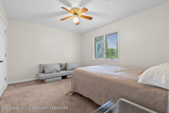 527 Day Rd, Owosso, MI 48867 - carpeted bedroom with baseboards and ceiling fan