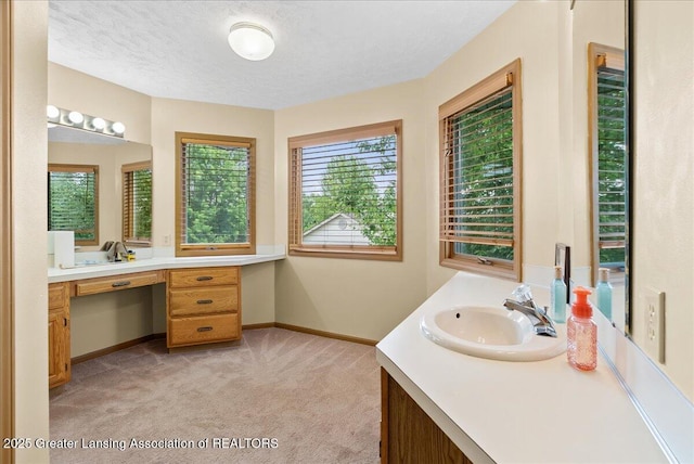 527 Day Rd, Owosso, MI 48867 - bathroom featuring vanity and a textured ceiling