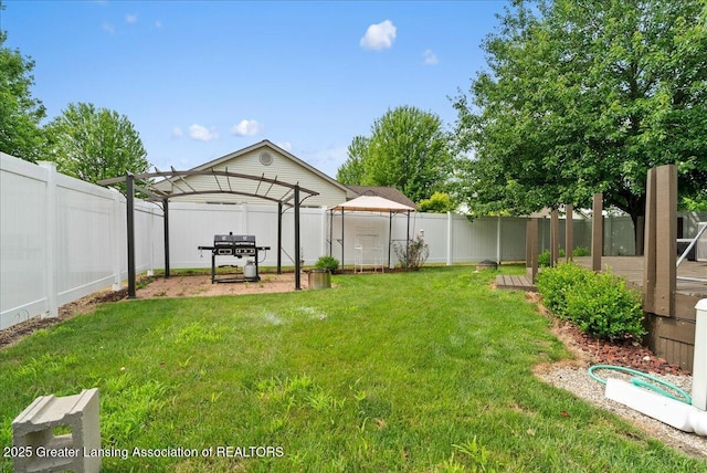 527 Day Rd, Owosso, MI 48867 - fenced backyard with a gazebo