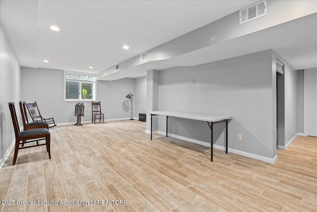 527 Day Rd, Owosso, MI 48867 - unfurnished room with light wood-style flooring and recessed lighting