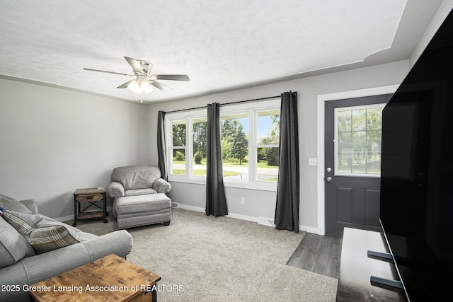 9514 Huntington Rd, Battle Creek, MI 49017 - living room with baseboards and ceiling fan
