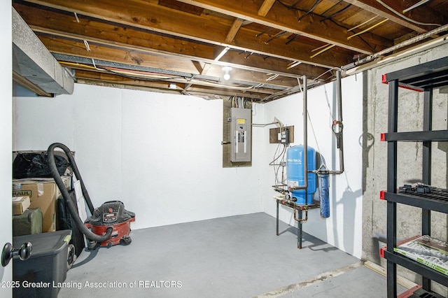 9514 Huntington Rd, Battle Creek, MI 49017 - unfinished basement featuring electric panel and a water pressure tank