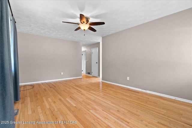 2218 Coolridge Rd, Holt, MI 48842 - spare room featuring ceiling fan and light wood-type flooring