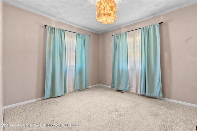 2218 Coolridge Rd, Holt, MI 48842 - carpeted empty room with healthy amount of natural light
