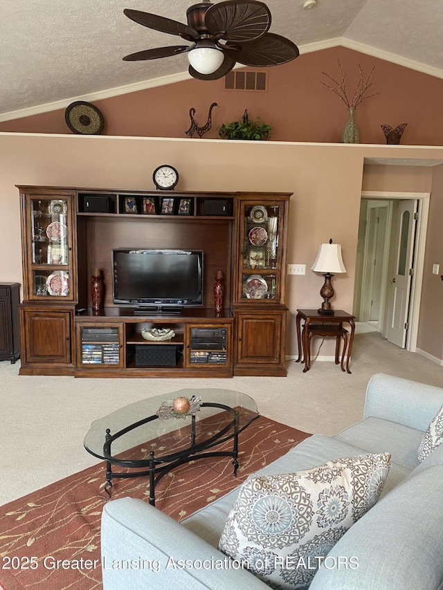 4001 Canyon Cv # 56, Holt, MI 48842 - carpeted living room featuring lofted ceiling, ceiling fan, and crown molding