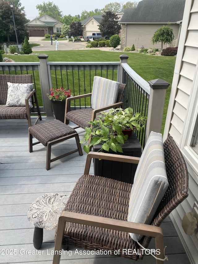 4001 Canyon Cv # 56, Holt, MI 48842 - deck with a lawn